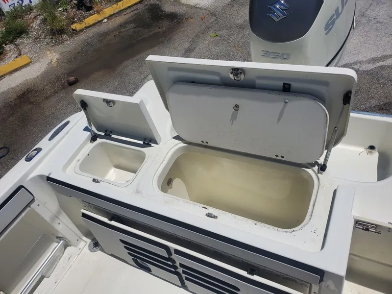 Slide: The Image of Open storage compartments on a 2003 Hydra-Sports 2400 CC Vector boat. - 21