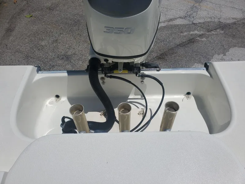 Slide: The Image of 2003 Hydra-Sports 2400 CC Vector boat with 350 engine, featuring rod holders. - 22