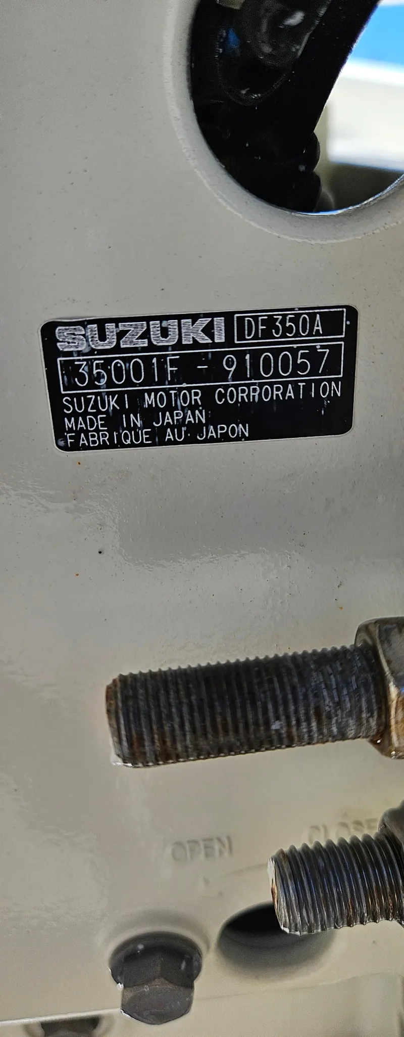 Slide: The Image of Close-up of a Suzuki DF350A engine label on a 2003 Hydra-Sports 2400 CC Vector. - 24