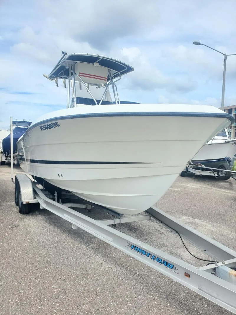 Slide: The Image of 2003 Hydra-Sports 2400 CC Vector boat on trailer, parked outdoors. - 29