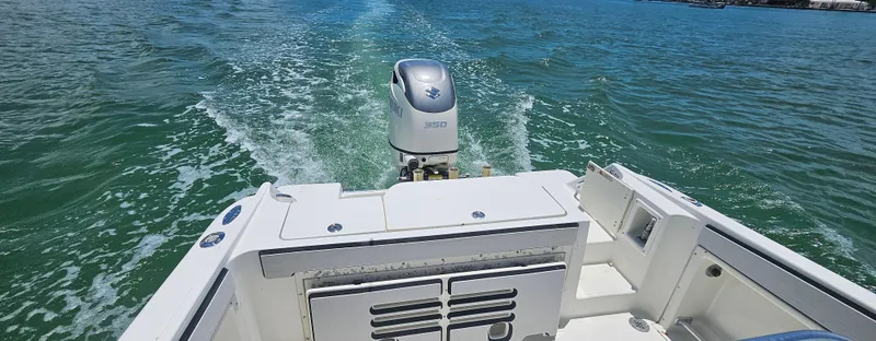 Slide: The Image of 2003 Hydra-Sports 2400 CC Vector boat cruising on open water. - 3