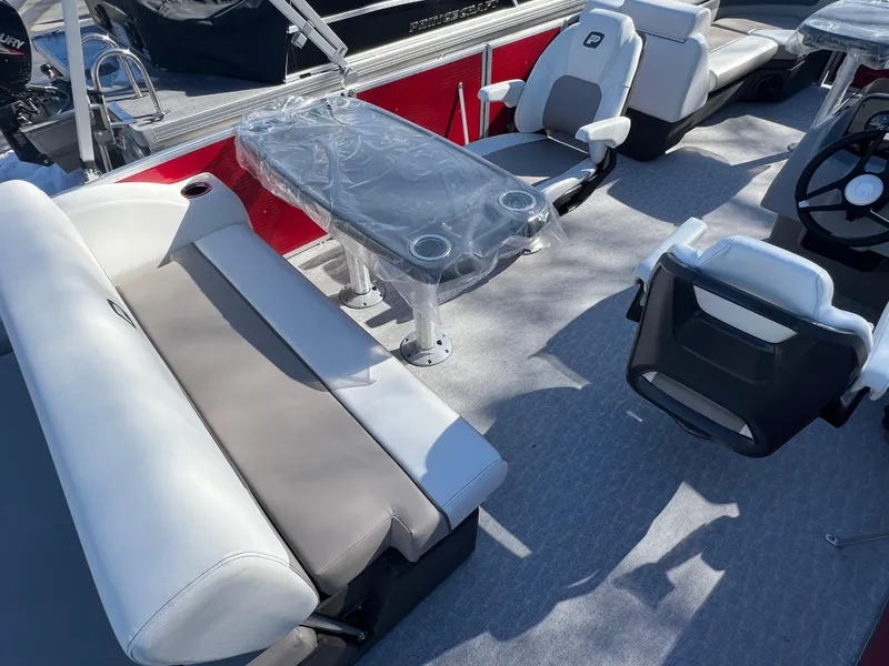 Slide: The Image of 2025 Princecraft Vectra 23 RL pontoon boat interior with seating and table setup. - 3