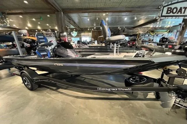 Slide: The Image of 2025 Ranger RT178 boat displayed in a showroom, showcasing sleek design and modern features. - 0