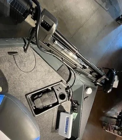 Slide: The Image of 2025 Ranger RT178 boat interior with trolling motor and Lowrance electronics. - 2