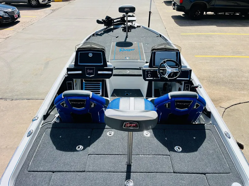 Slide: The Image of 2025 Ranger Z521R Cup-Equipped boat interior with dual seats and advanced dashboard. - 11