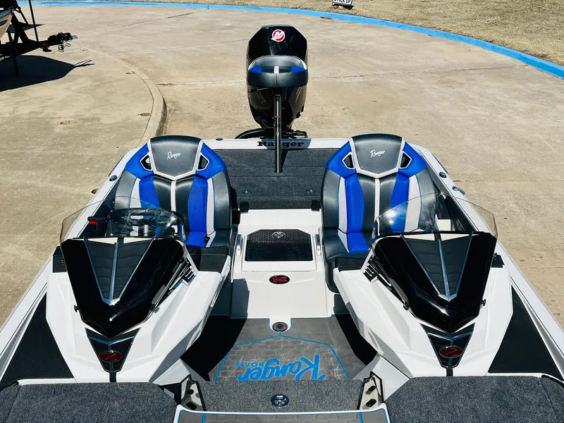 Slide: The Image of 2025 Ranger Z521R Cup-Equipped boat with dual blue seats and sleek design. - 32