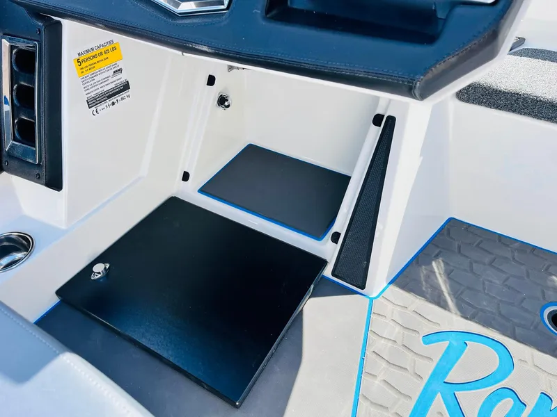 Slide: The Image of 2025 Ranger Z521R Cup-Equipped boat interior storage compartment with sleek design and modern features. - 39