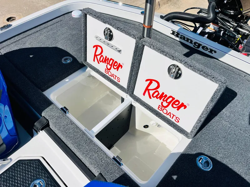 Slide: The Image of 2025 Ranger Z521R Cup-Equipped boat storage compartments with Ranger Boats branding. - 49