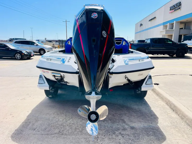 Slide: The Image of 2025 Ranger Z521R Cup-Equipped boat, rear view, parked outdoors. - 9