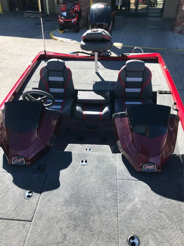 Slide: The Image of 2025 Ranger RT188P boat interior with dual seats and steering wheel. - 5