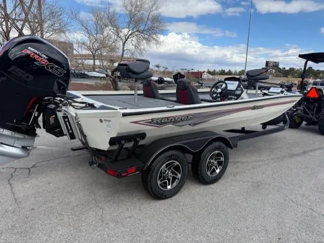 Slide: The Image of 2025 Ranger RT198P boat on trailer, featuring powerful outboard motor. - 4