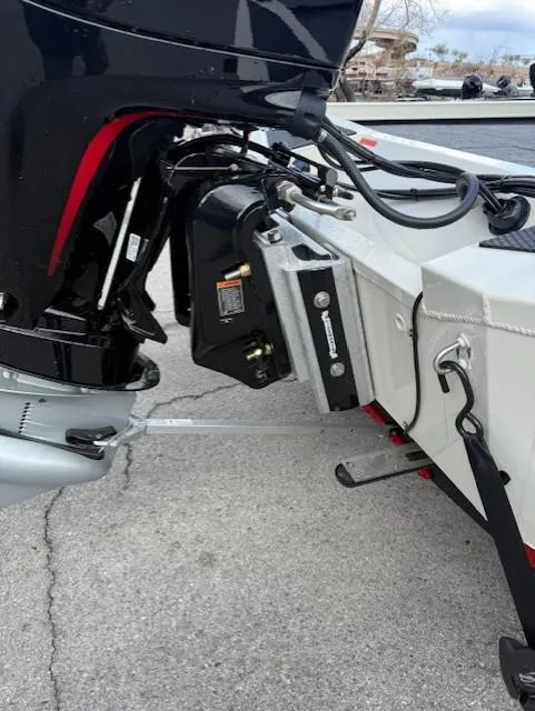 Slide: The Image of 2025 Ranger RT198P boat motor and transom detail, showcasing engine and mounting components. - 9