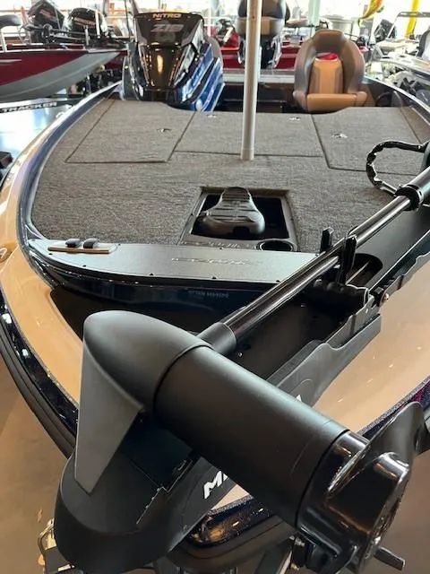 Slide: The Image of 2025 Nitro Z19 boat interior with trolling motor and spacious deck. - 2