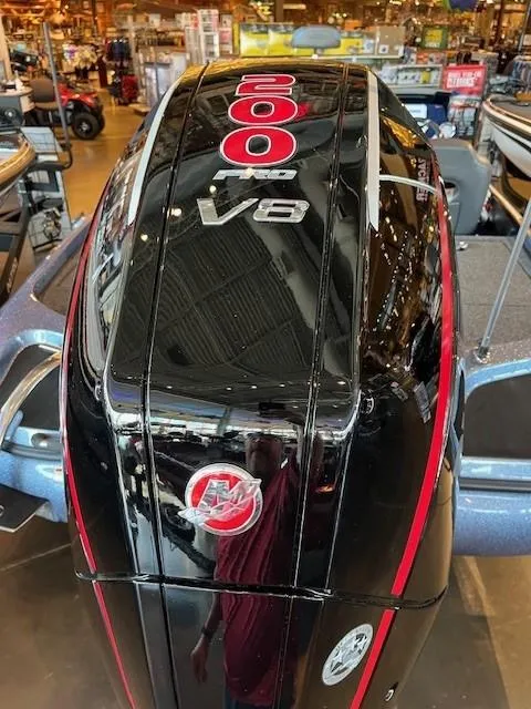 Slide: The Image of 2025 Nitro Z19 boat with 200 V8 engine, displayed in a showroom. - 3