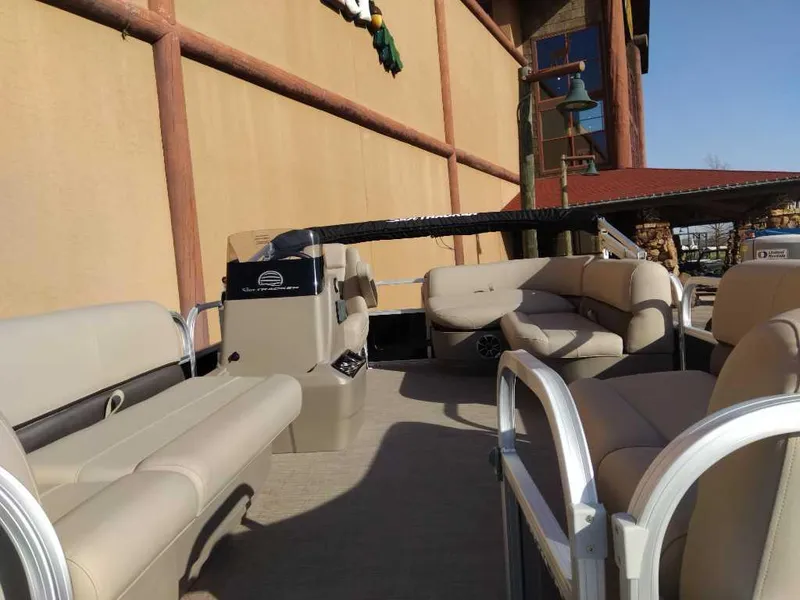 Slide: The Image of 2025 Sun Tracker Party Barge 16 DLX pontoon boat with spacious seating and modern design. - 53