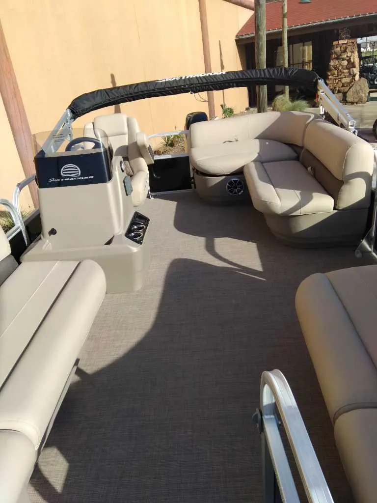 Slide: The Image of 2025 Sun Tracker Party Barge 16 DLX pontoon boat with spacious seating and modern design. - 54