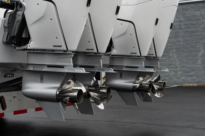 Slide: The Image of 2025 Twin Vee 400 GFX CC boat engines with stainless steel propellers. - 13