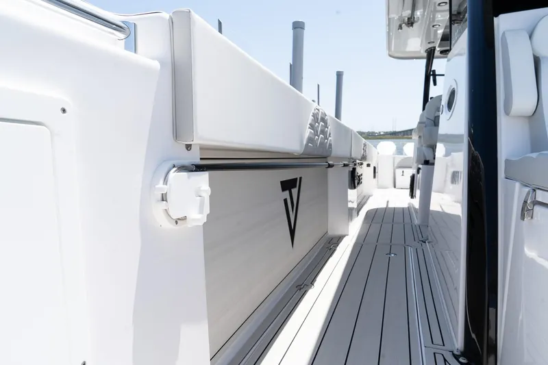 Slide: The Image of 2025 Twin Vee 400 GFX CC boat deck, sleek design, modern features. - 43