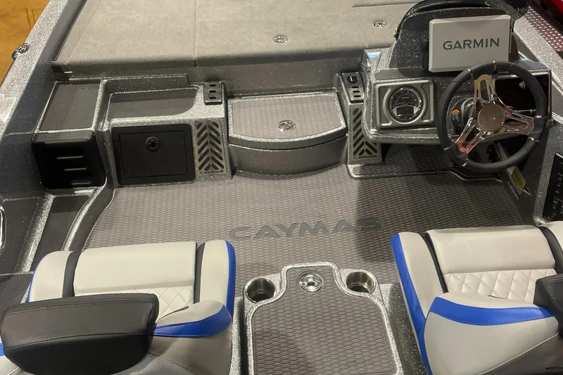 Slide: The Image of 2025 Caymas CX 20 PRO boat interior with Garmin navigation system and stylish seating. - 3
