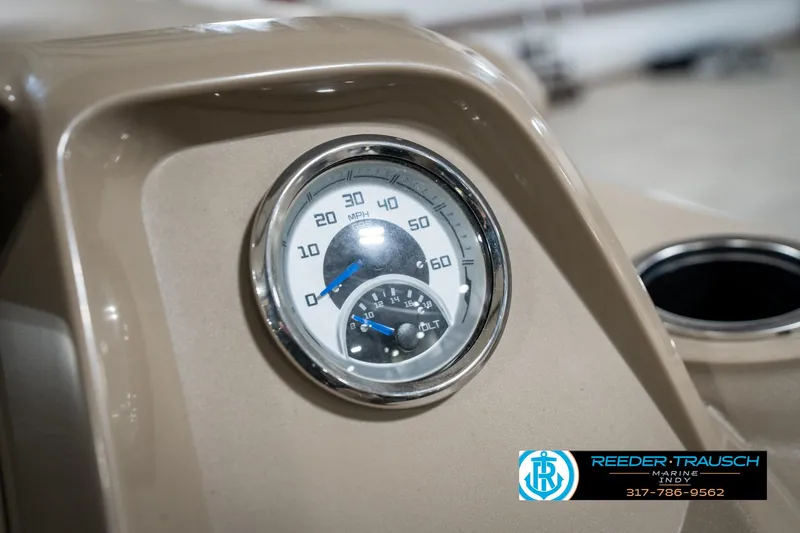 Slide: The Image of 2024 SunChaser 16 Vista dashboard with speedometer and voltmeter, Reeder-Trausch logo visible. - 31