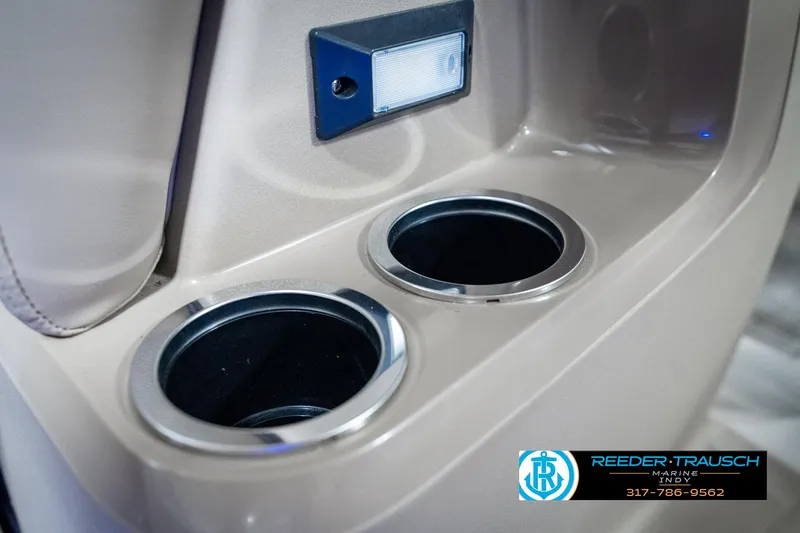 Slide: The Image of Cup holders and light in 2024 SunChaser 16 Vista boat interior. - 38