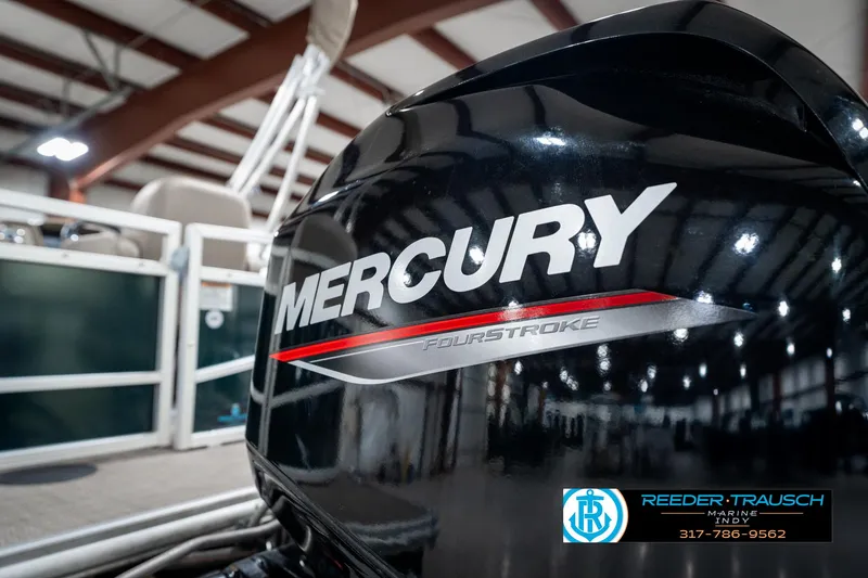 Slide: The Image of 2024 SunChaser 16 Vista with Mercury FourStroke engine in a showroom. - 41