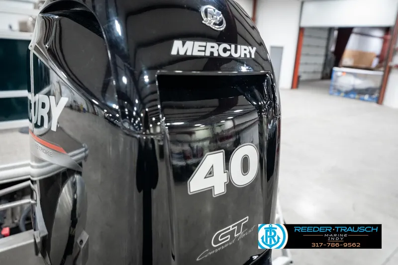 Slide: The Image of 2024 SunChaser 16 Vista with Mercury 40 GT outboard motor in a showroom. - 42