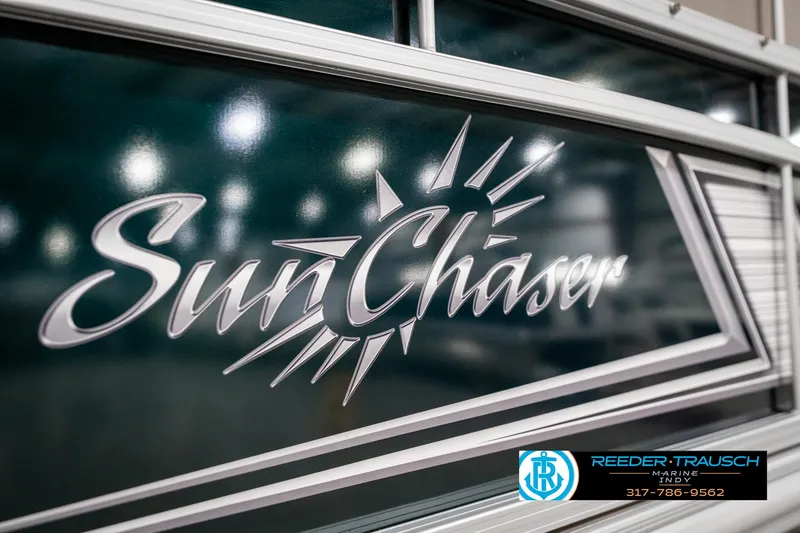 Slide: The Image of 2024 SunChaser 16 Vista logo on a boat with dealership contact information. - 44