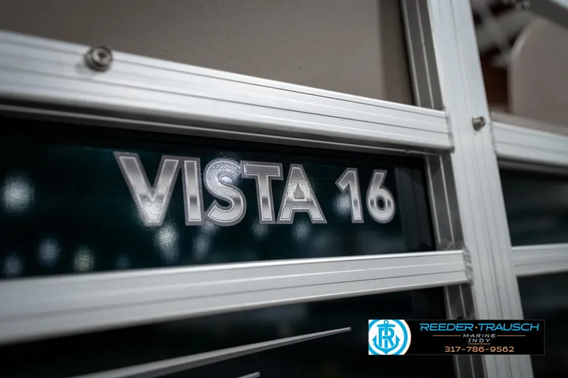 Slide: The Image of 2024 SunChaser 16 Vista boat nameplate with Reeder-Trausch logo and contact information. - 45