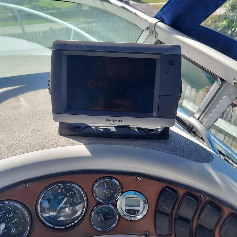 Slide: The Image of Dashboard of a 2000 Crownline 242 CR boat with Garmin GPS device. - 21