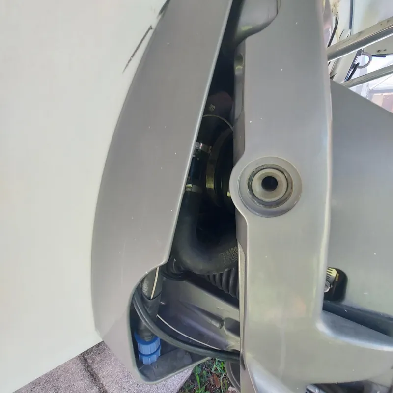 Slide: The Image of Close-up of a 2000 Crownline 242 CR boat engine component. - 35