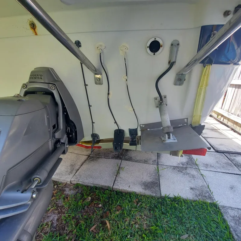 Slide: The Image of Rear view of a 2000 Crownline 242 CR boat showing engine and wiring. - 37