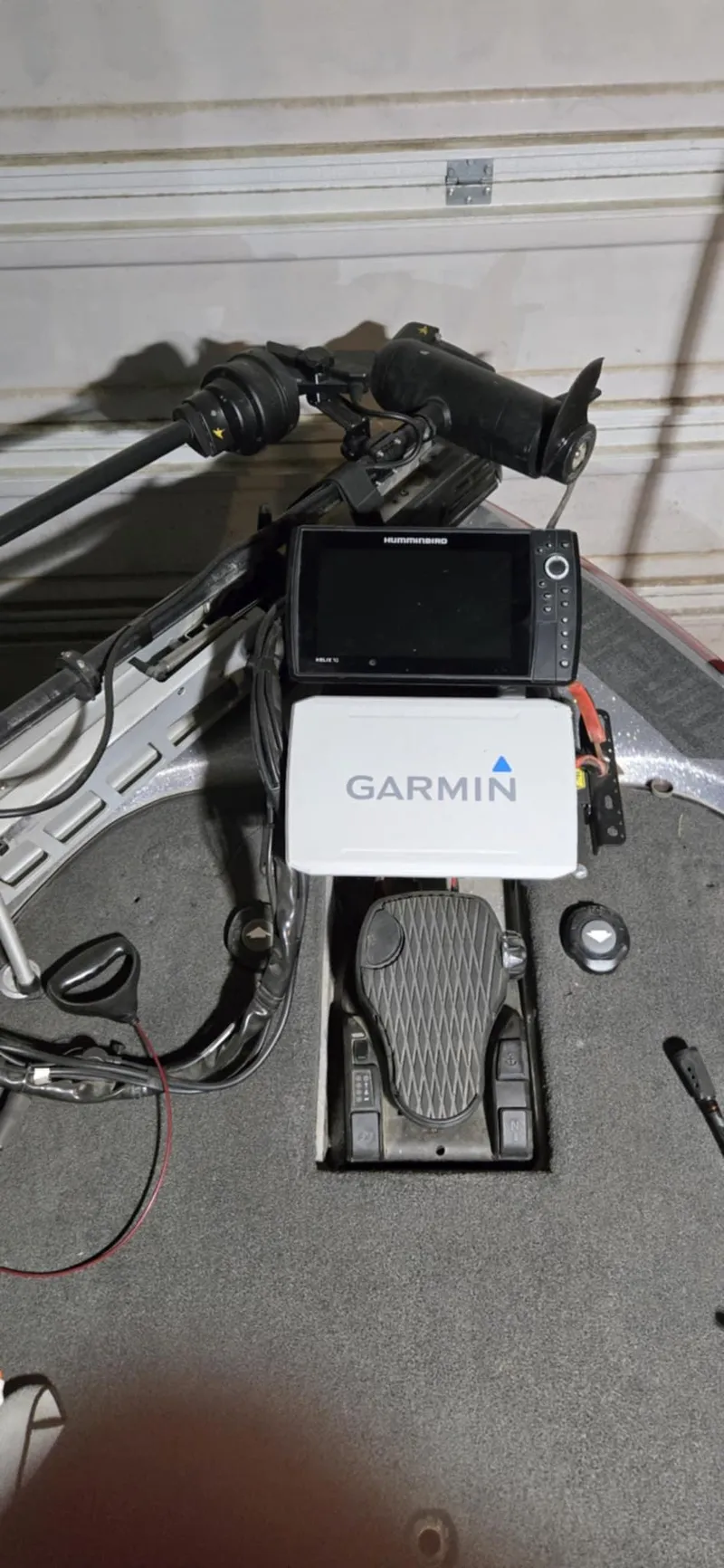 Slide: The Image of 2013 Skeeter ZX20 boat with Garmin navigation system and foot pedal control. - 6