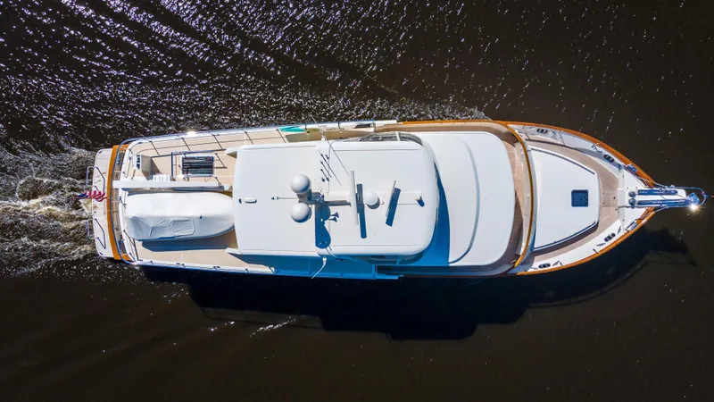 Slide: The Image of Aerial view of 2027 Fleming 78 yacht cruising on water. - 4