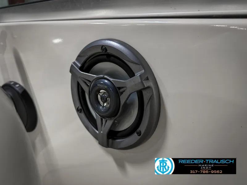 Slide: The Image of Speaker installed on a 2007 Bryant 240 boat, featuring Reeder-Trausch branding. - 45