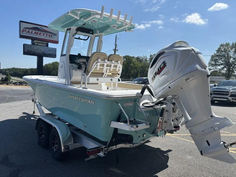 Slide: The Image of Steering console of 2026 Sportsman Masters 227 Bay Boat with controls and display. - 13