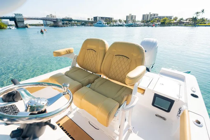 Slide: The Image of T-top speakers and lights on 2026 Sportsman Masters 227 Bay Boat. - 35