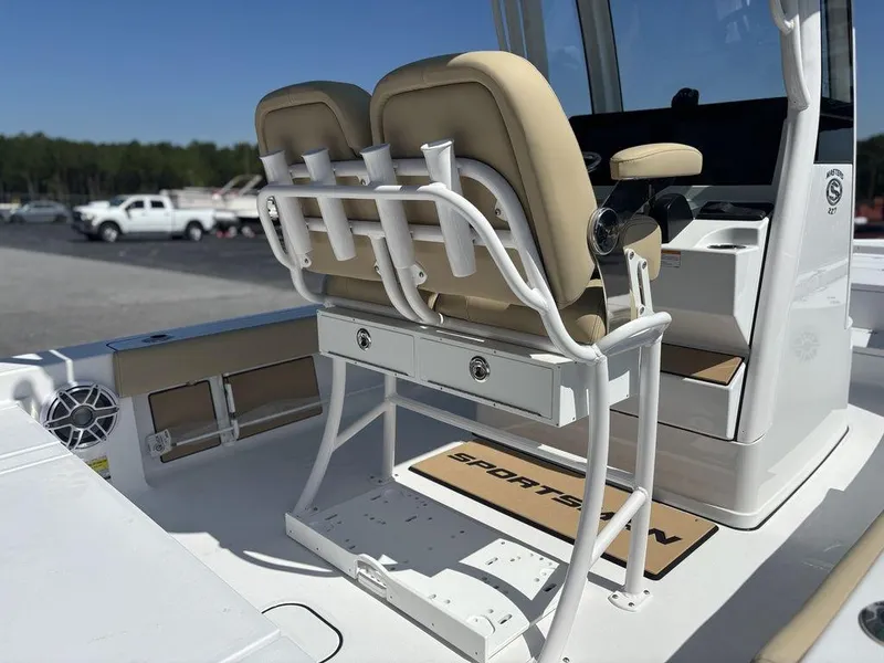Slide: The Image of 2026 Sportsman Masters 227 Bay Boat cruising with passengers on a sunny day. - 4