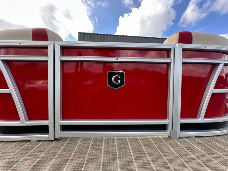 Slide: The Image of 2025 Godfrey SWEETWATER 2286 SB pontoon boat with red exterior and silver railing. - 3