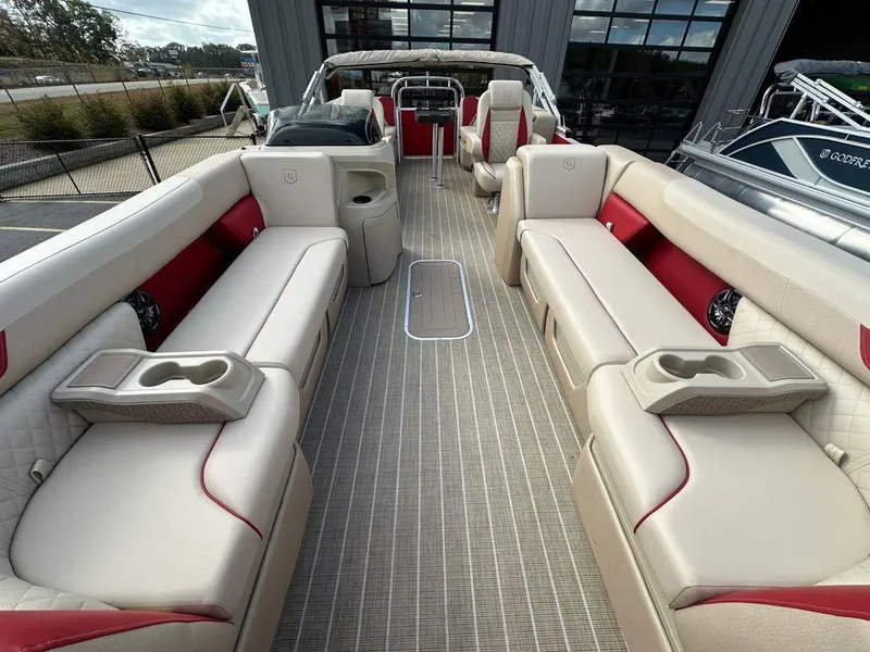 Slide: The Image of 2025 Godfrey SWEETWATER 2286 SB pontoon boat with spacious seating and modern design. - 4