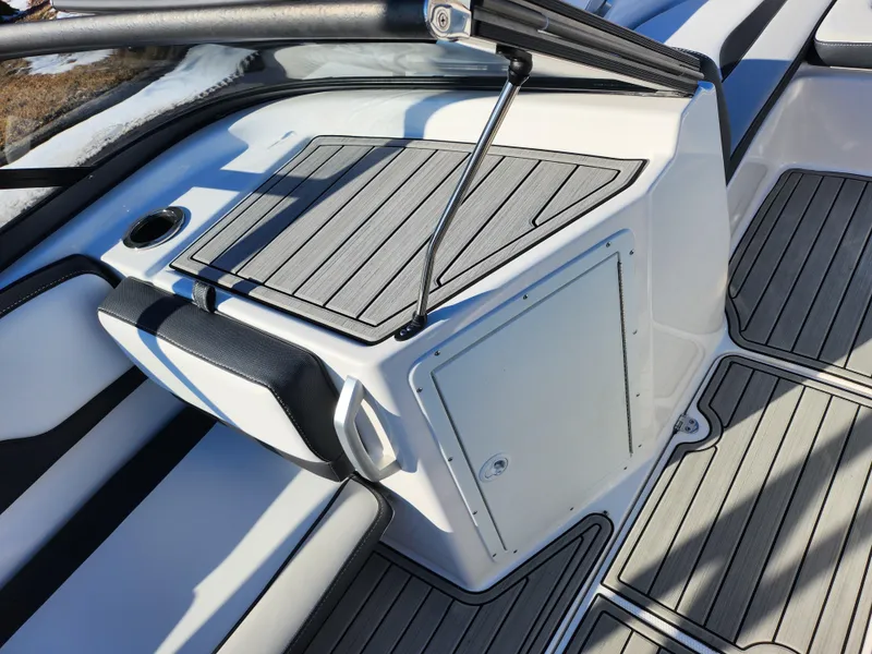 Slide: The Image of 2021 Yamaha Boats AR195 interior with sleek seating and modern design. - 14