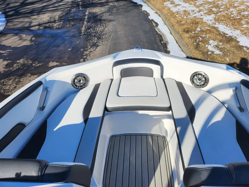 Slide: The Image of 2021 Yamaha Boats AR195 interior with sleek seating and modern design. - 16