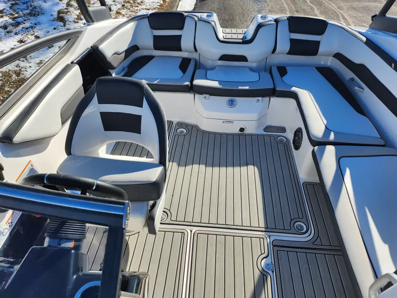 Slide: The Image of 2021 Yamaha Boats AR195 interior with sleek seating and modern design. - 19