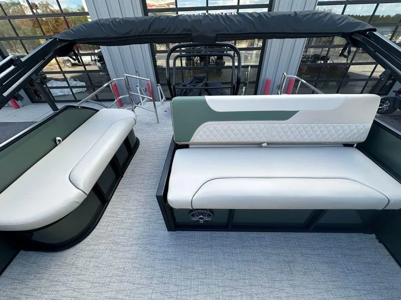 Slide: The Image of 2025 Godfrey Sweetwater 2286 SFLC boat interior with modern seating and sleek design. - 11