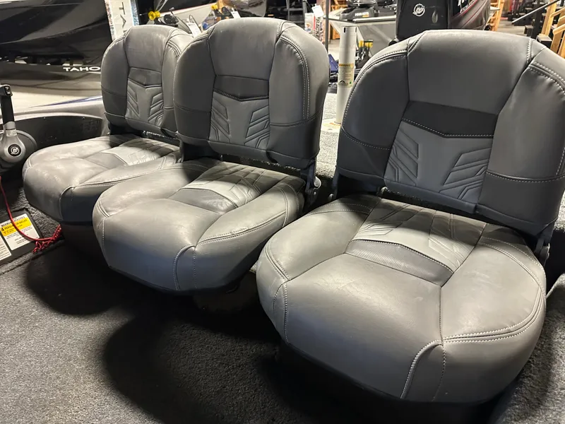 Slide: The Image of 2019 Tracker Pro Team 175 TF boat seats, gray upholstery, three seats in a row. - 10