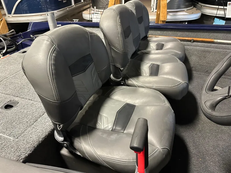 Slide: The Image of 2019 Tracker Pro Team 175 TF boat seats, gray leather, interior view. - 13