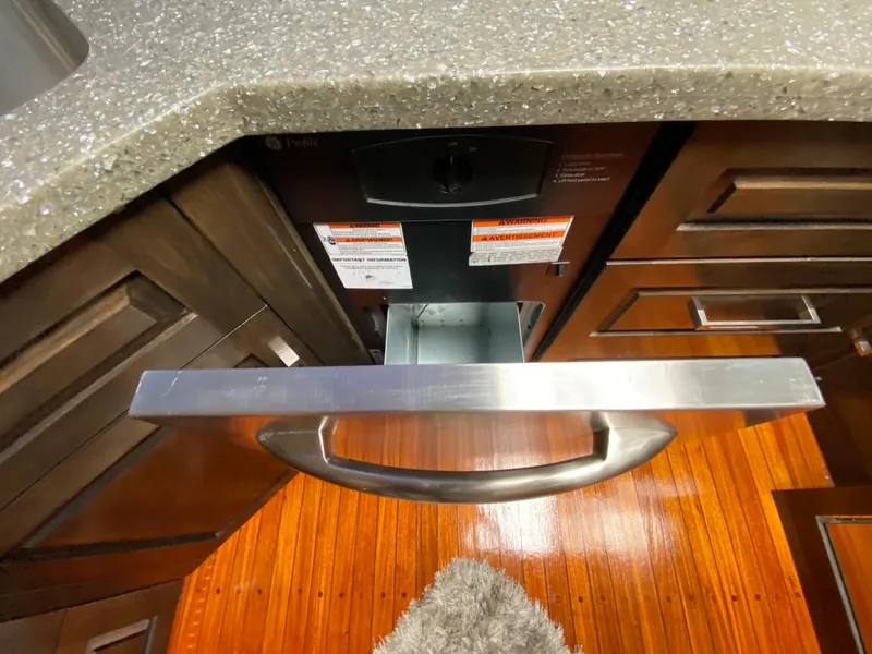 Slide: The Image of Open drawer in Mares 58 Power Cat kitchen, 1995 model, with wooden flooring and modern cabinetry. - 41