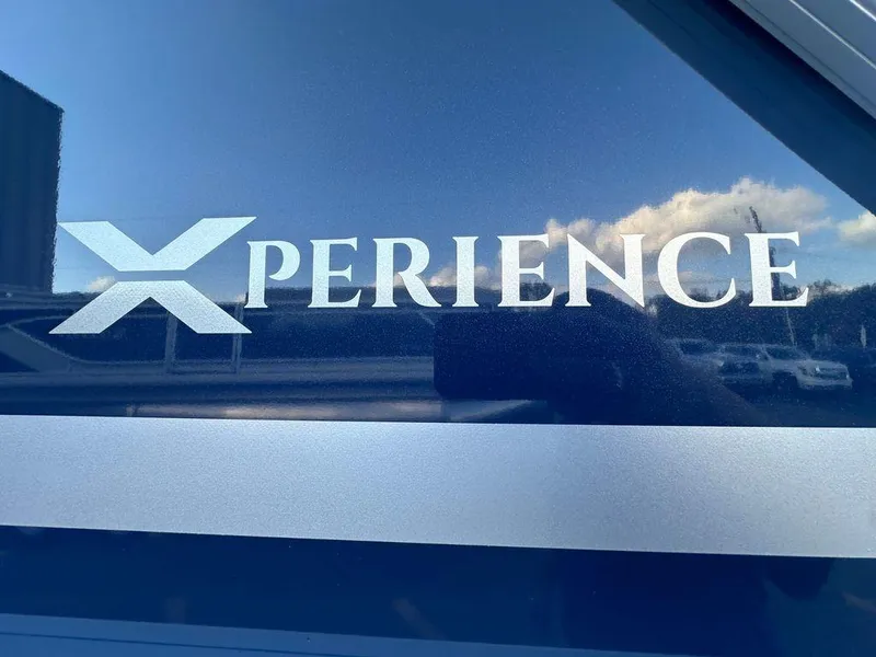 Slide: The Image of 2025 Godfrey Xperience 2286 SFLX logo on blue background. - 8