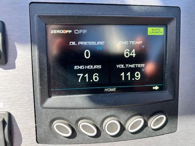 Slide: The Image of Dashboard display of 2022 MasterCraft NXT20 showing engine metrics and settings. - 18