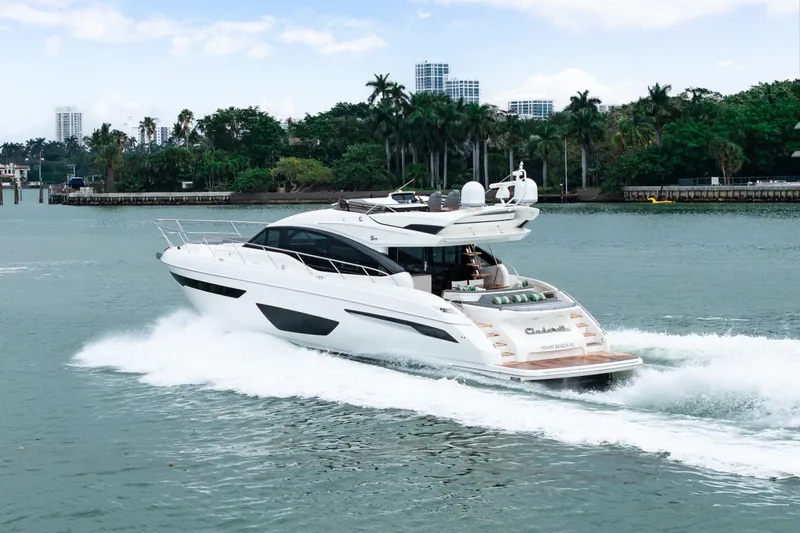 Slide: The Image of Luxury 2017 Princess S65 yacht cruising on a scenic waterway. - 1